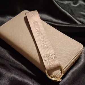 Steve Madden Beige Wristlet with Gold Accents .like New